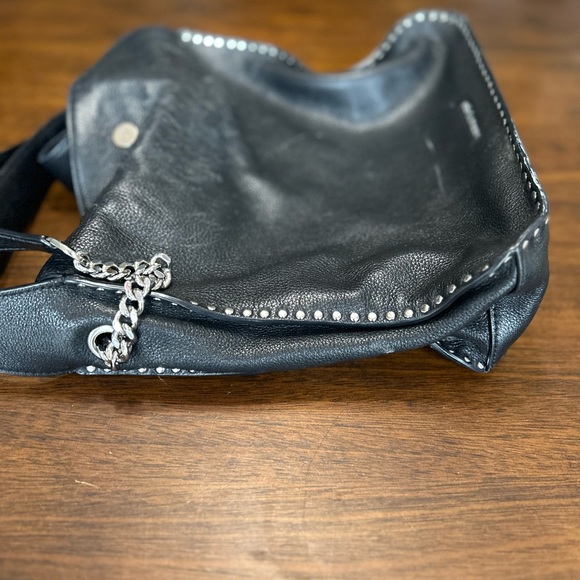 This is a Michael Kors bag black. Very good condition. - Picture 5 of 6